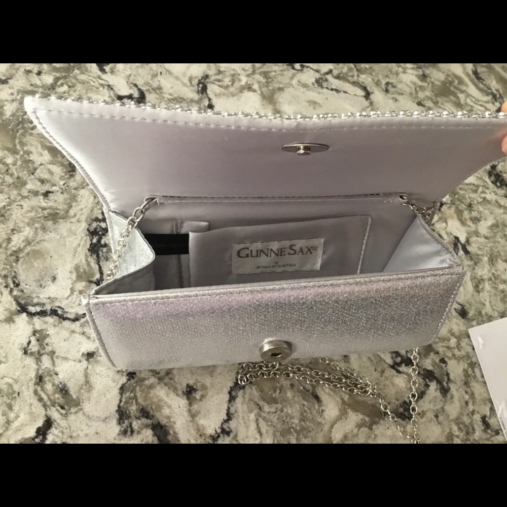 Small silver clutch w/ chain strap